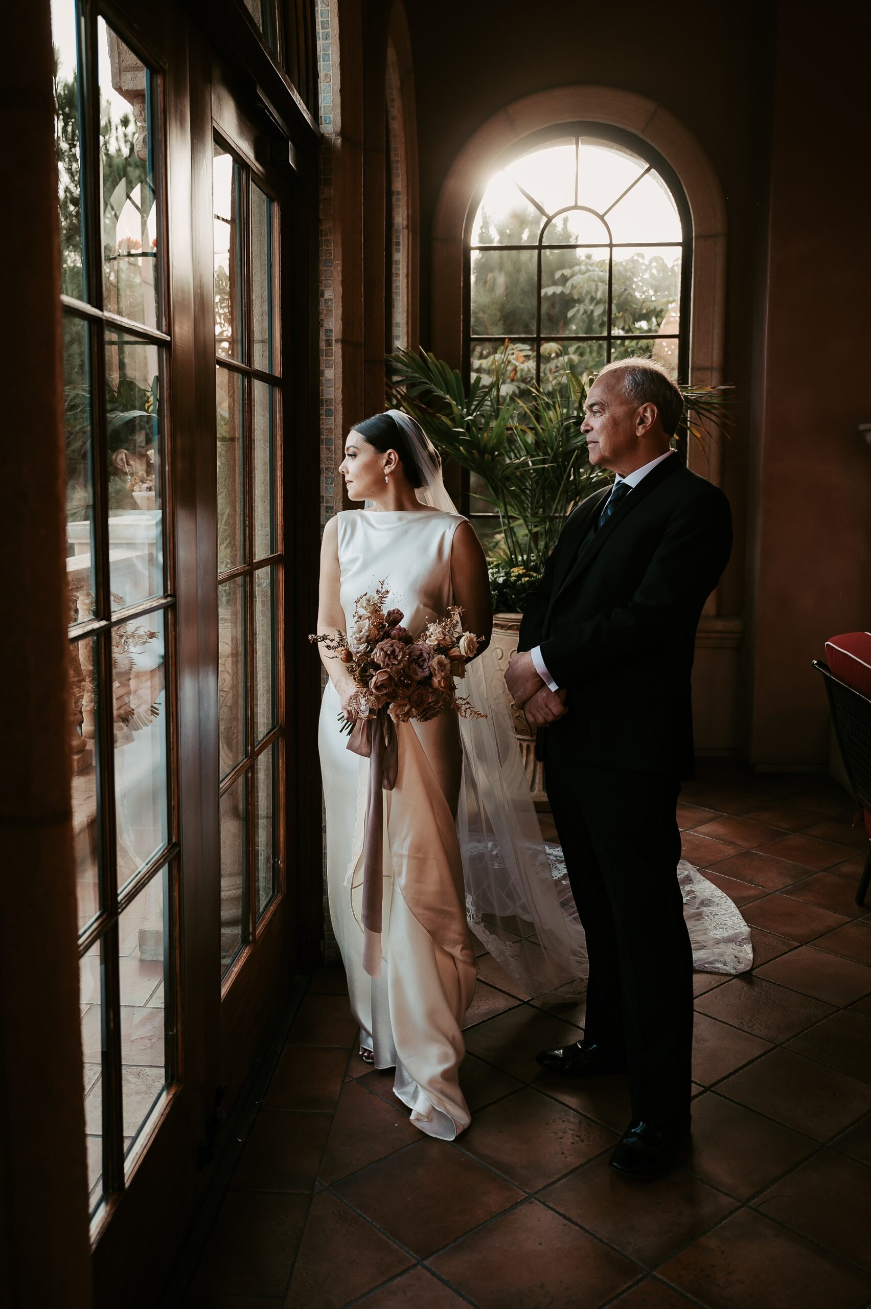 Bride and her father looking out at wedding ceremony site at Fairmont Grand Del Mar Hotel Southern California Wedding Photos